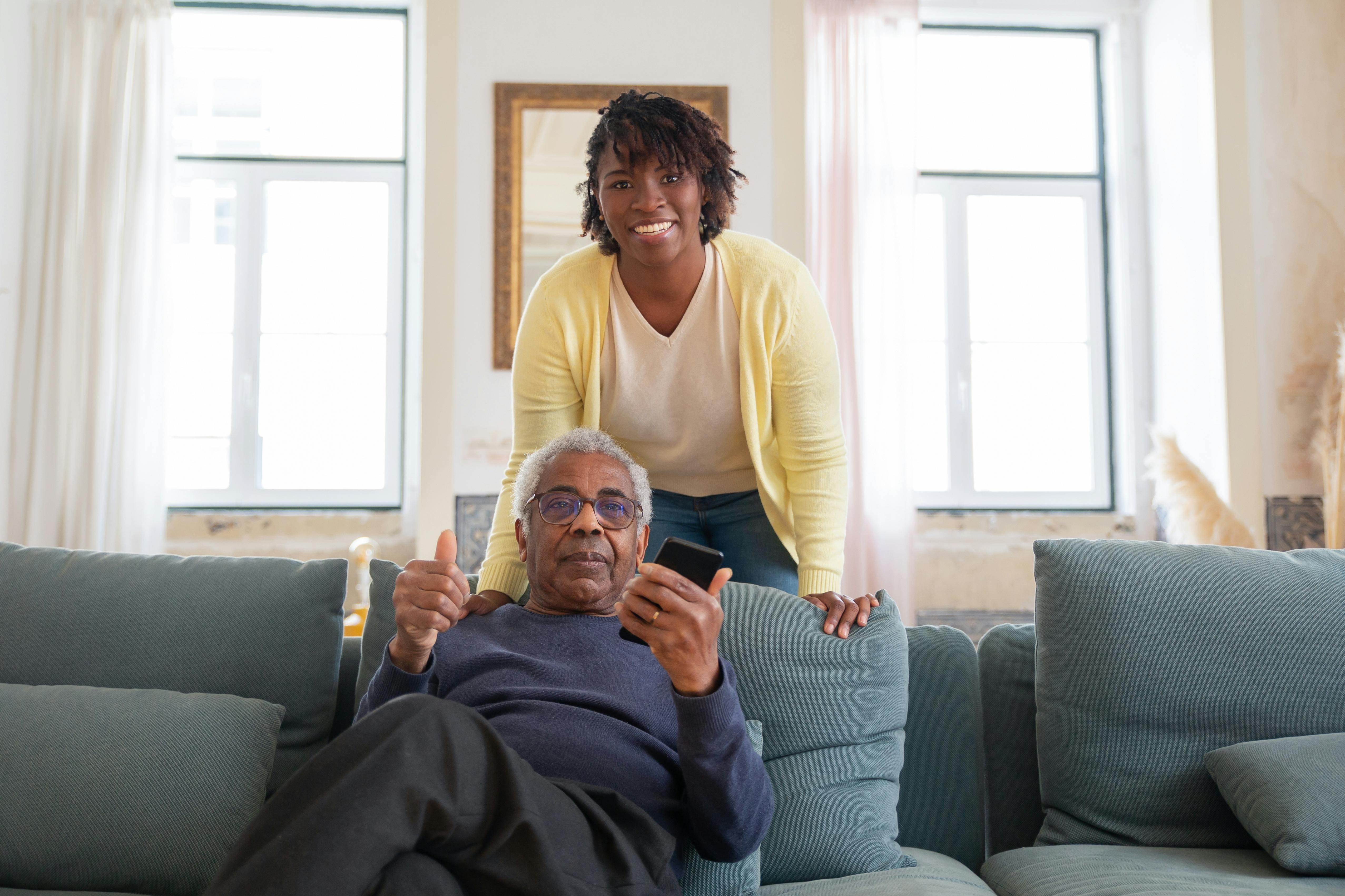 senior citizen giving thumbs up