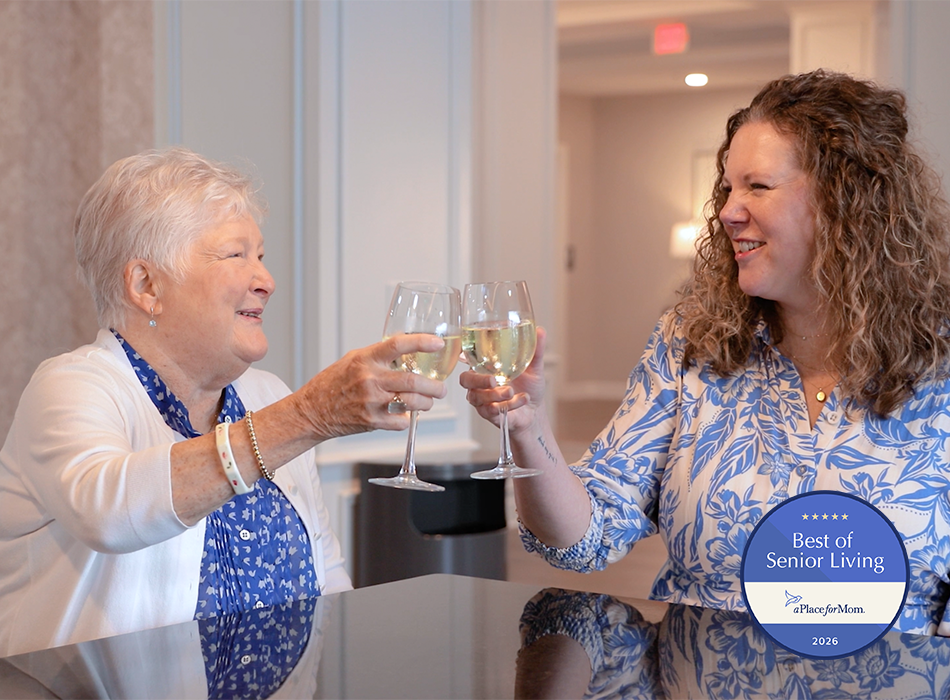 tenant and staff sharing a wine and having a toast