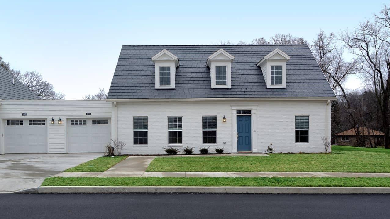 Exterior view of a cottage at apple blossom