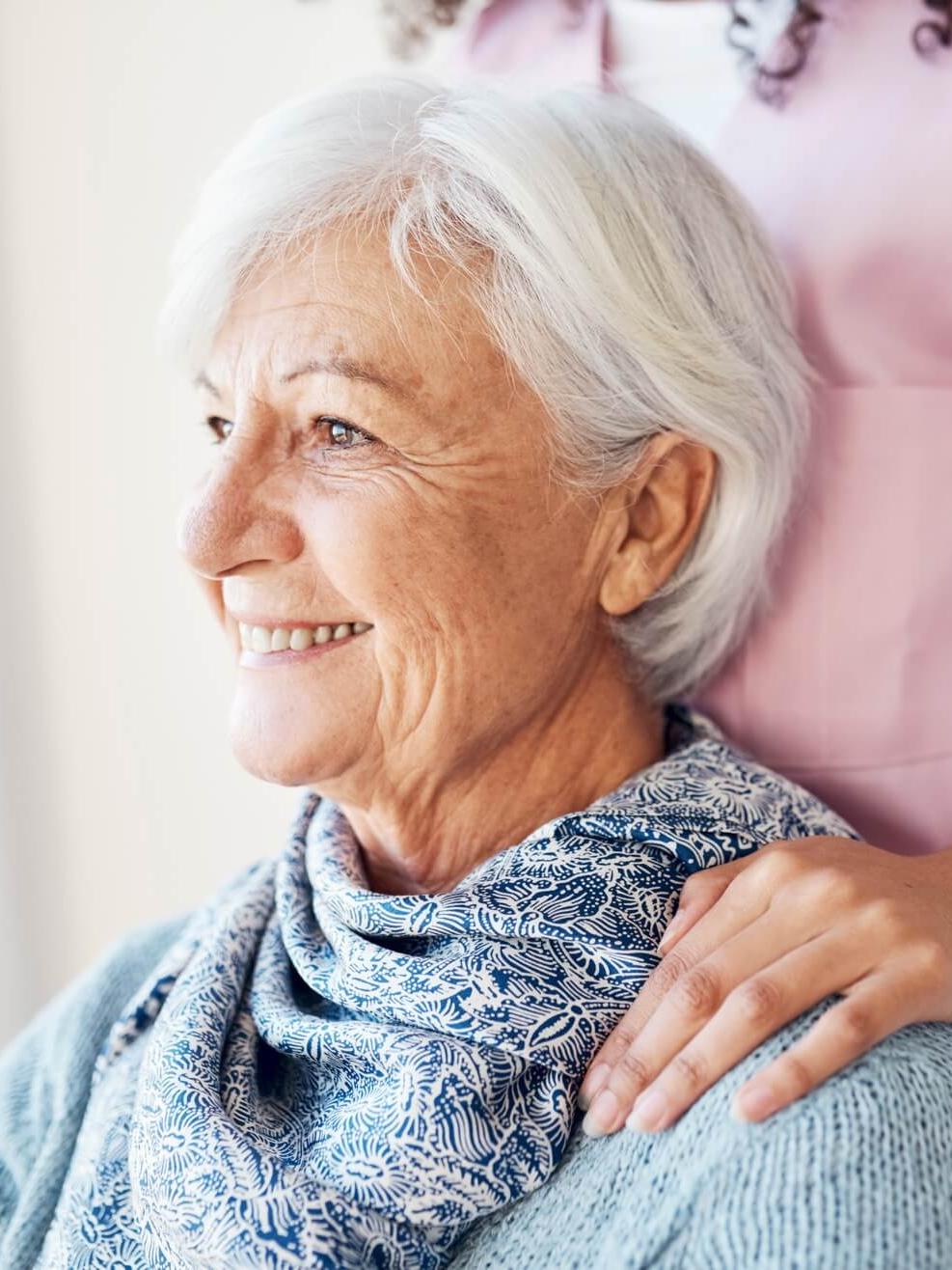 woman sitting with caregiver