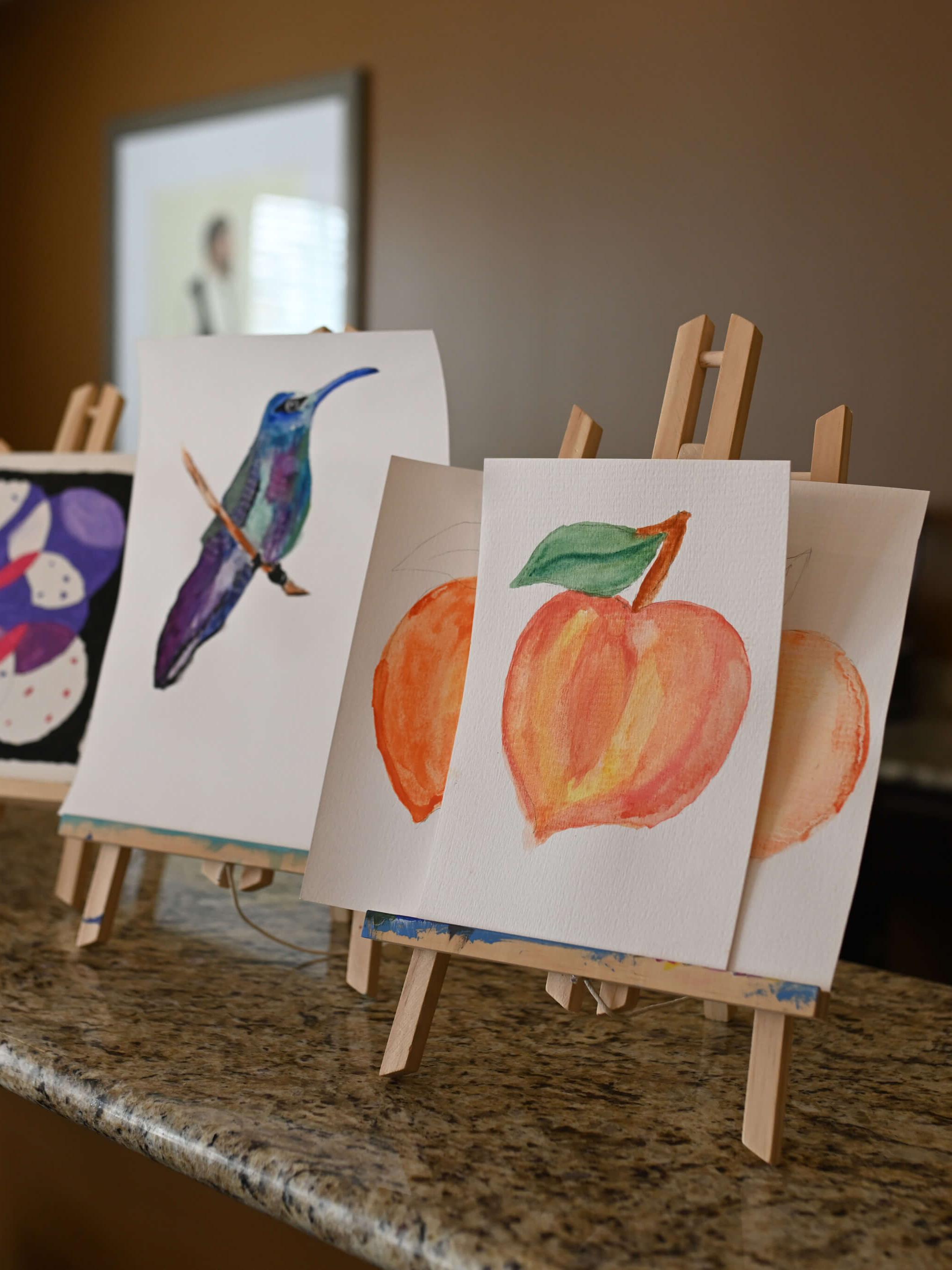 display of artwork hand painted by residents